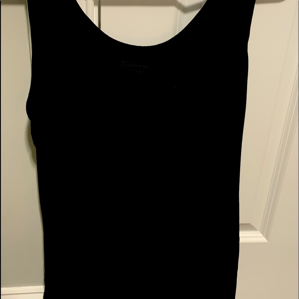Woman’s black tank top